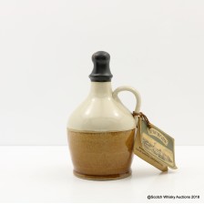 BOWMORE 1955 CERAMIC DECANTER COMMEMORATING THE OPENING OF THE DISTILLERY S VISITOR CENTRE 12TH SEPTEMBER 1974